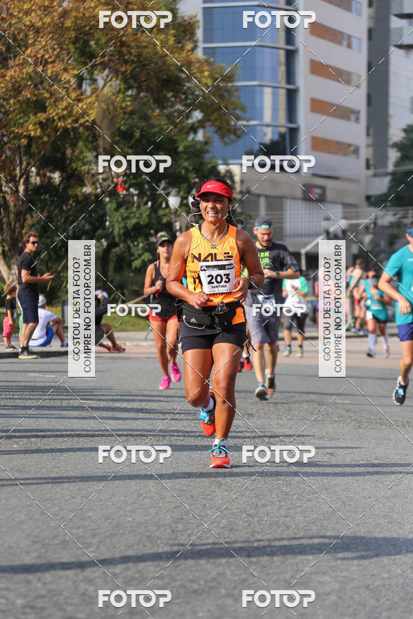 Buy your photos of the eventMeia Maratona Internacional de Curitiba 2018 on Fotop