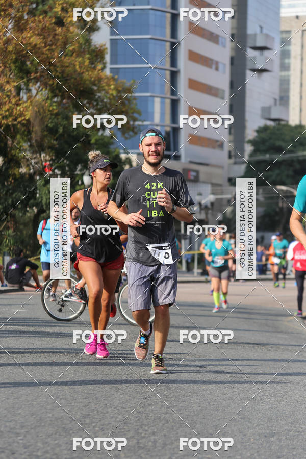 Buy your photos of the eventMeia Maratona Internacional de Curitiba 2018 on Fotop