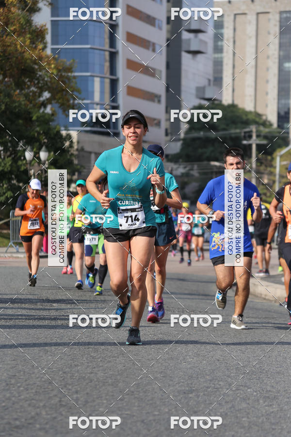 Buy your photos of the eventMeia Maratona Internacional de Curitiba 2018 on Fotop