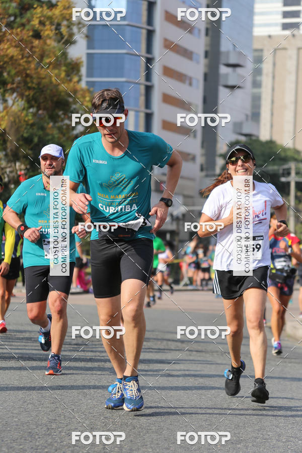 Buy your photos of the eventMeia Maratona Internacional de Curitiba 2018 on Fotop