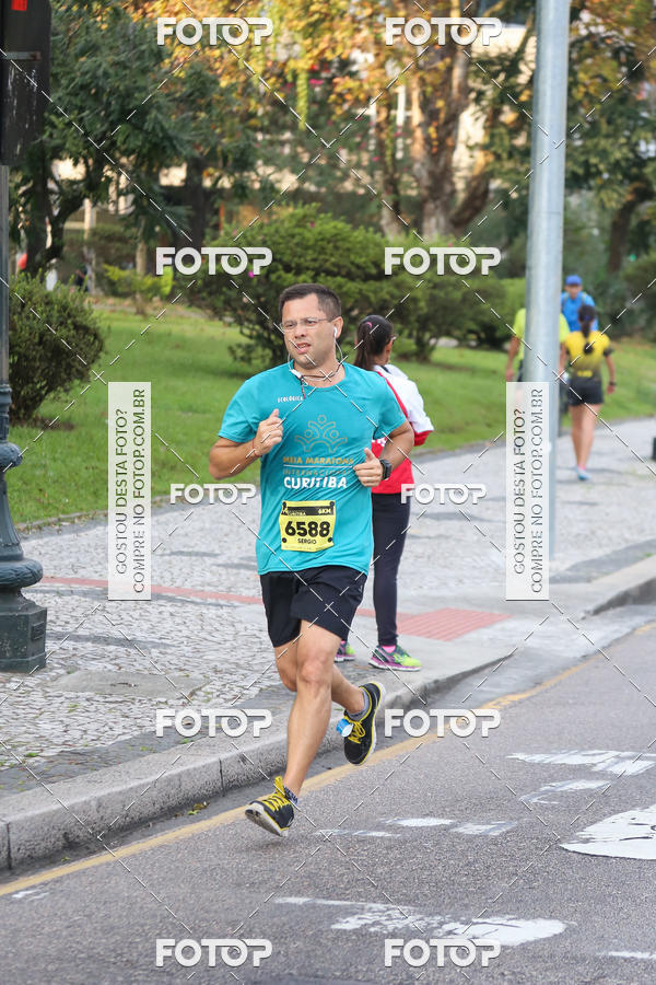 Buy your photos of the eventMeia Maratona Internacional de Curitiba 2018 on Fotop