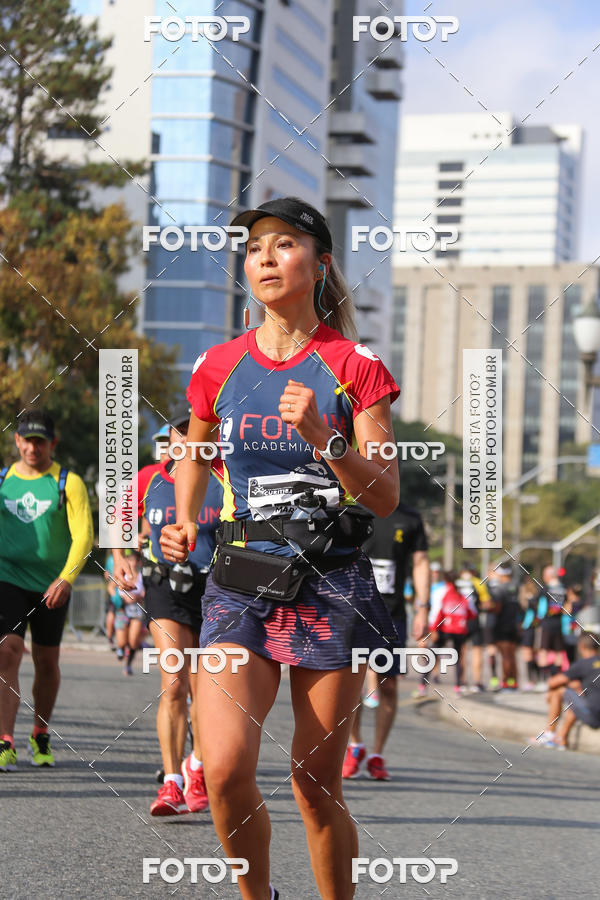Buy your photos of the eventMeia Maratona Internacional de Curitiba 2018 on Fotop