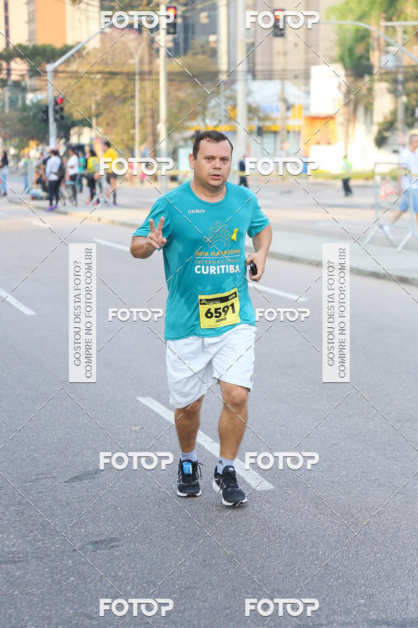 Buy your photos of the eventMeia Maratona Internacional de Curitiba 2018 on Fotop