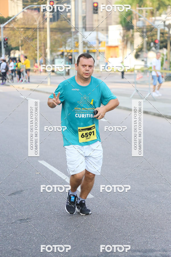 Buy your photos of the eventMeia Maratona Internacional de Curitiba 2018 on Fotop