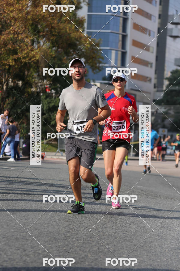 Buy your photos of the eventMeia Maratona Internacional de Curitiba 2018 on Fotop