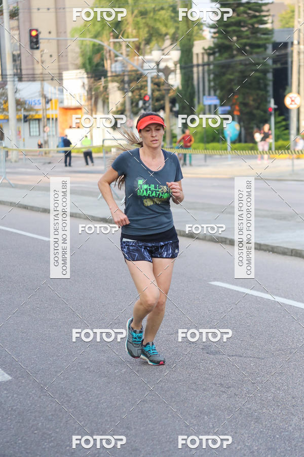 Buy your photos of the eventMeia Maratona Internacional de Curitiba 2018 on Fotop