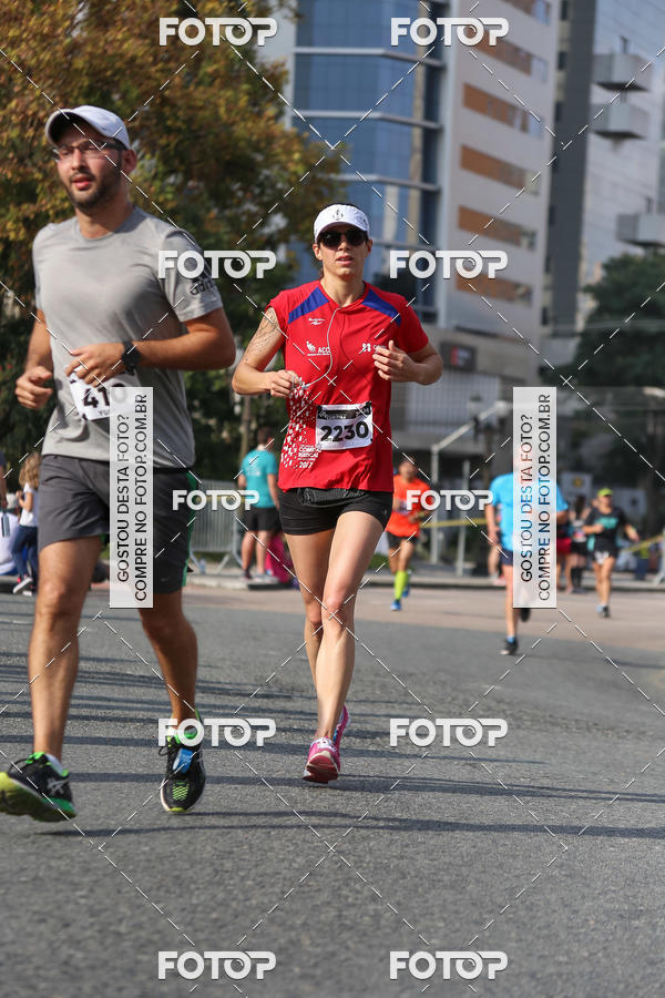 Buy your photos of the eventMeia Maratona Internacional de Curitiba 2018 on Fotop