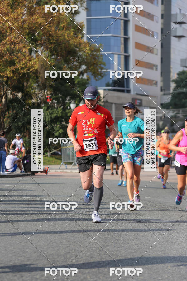 Buy your photos of the eventMeia Maratona Internacional de Curitiba 2018 on Fotop