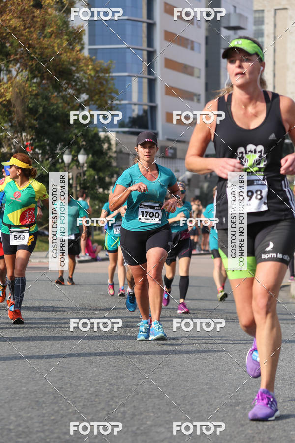 Buy your photos of the eventMeia Maratona Internacional de Curitiba 2018 on Fotop
