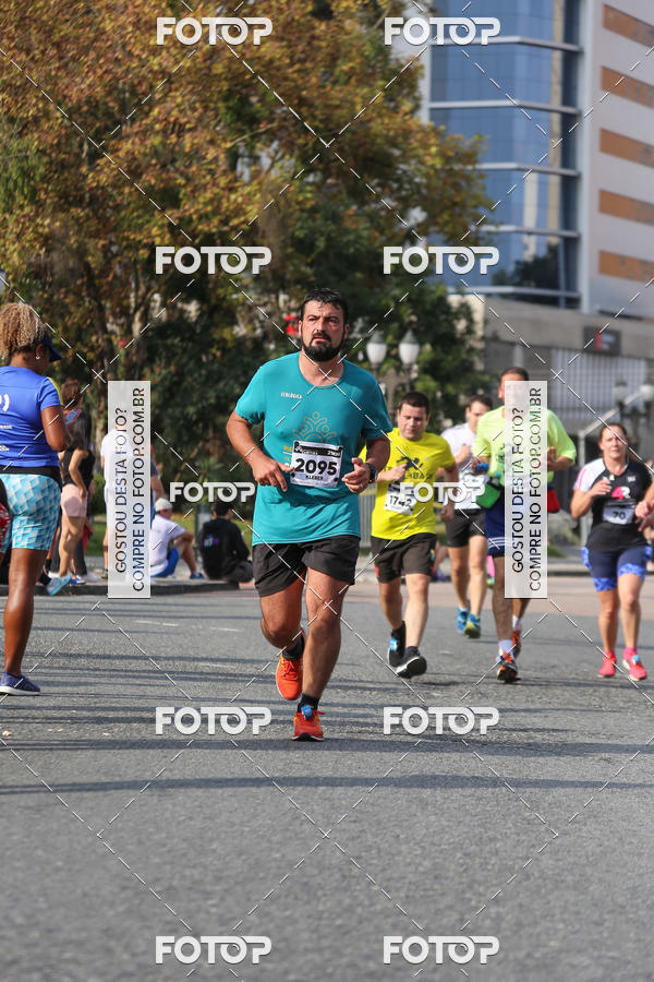Buy your photos of the eventMeia Maratona Internacional de Curitiba 2018 on Fotop