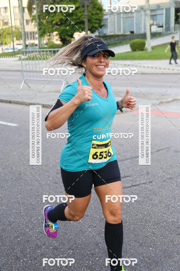 Buy your photos of the eventMeia Maratona Internacional de Curitiba 2018 on Fotop