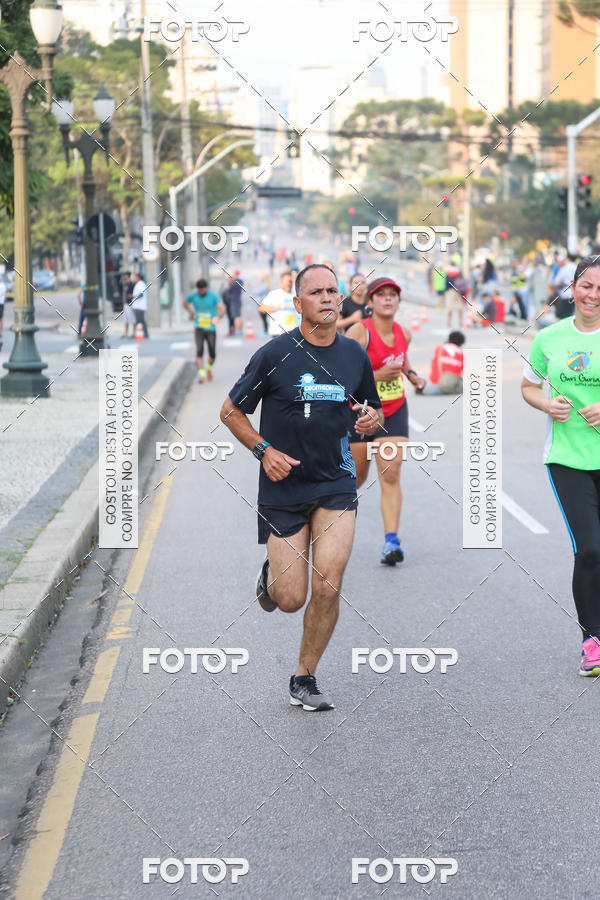 Buy your photos of the eventMeia Maratona Internacional de Curitiba 2018 on Fotop