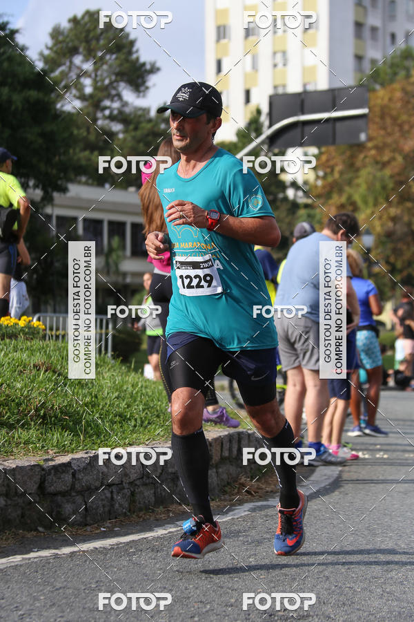 Buy your photos of the eventMeia Maratona Internacional de Curitiba 2018 on Fotop