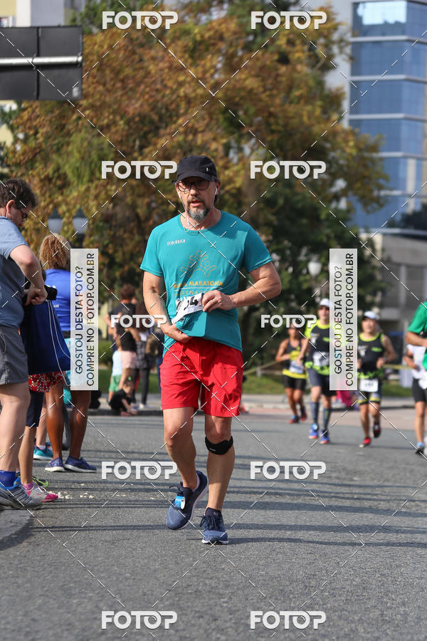 Buy your photos of the eventMeia Maratona Internacional de Curitiba 2018 on Fotop