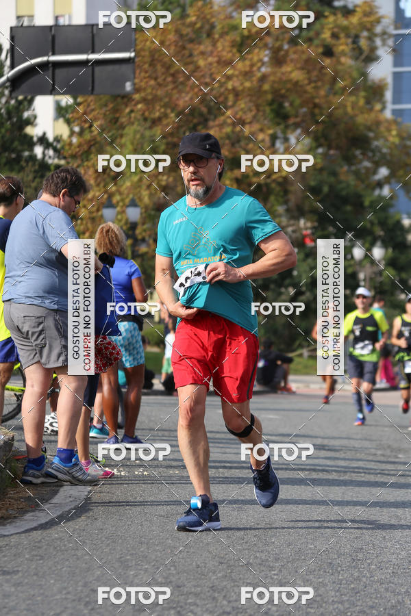 Buy your photos of the eventMeia Maratona Internacional de Curitiba 2018 on Fotop