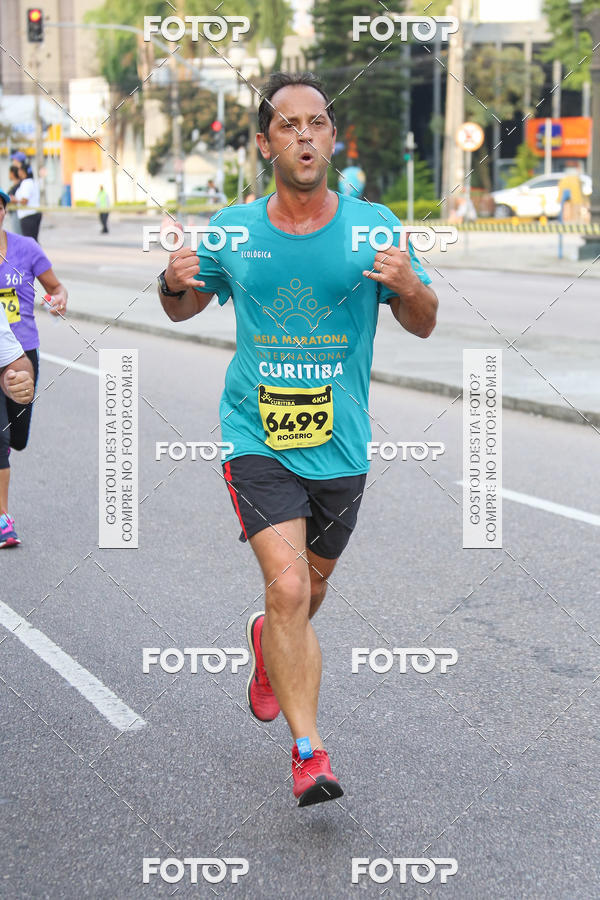 Buy your photos of the eventMeia Maratona Internacional de Curitiba 2018 on Fotop