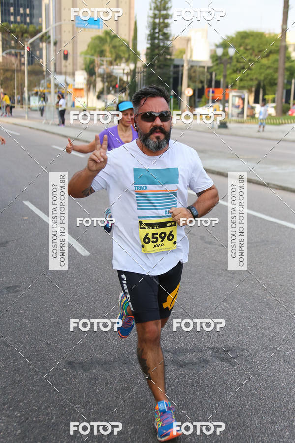 Buy your photos of the eventMeia Maratona Internacional de Curitiba 2018 on Fotop