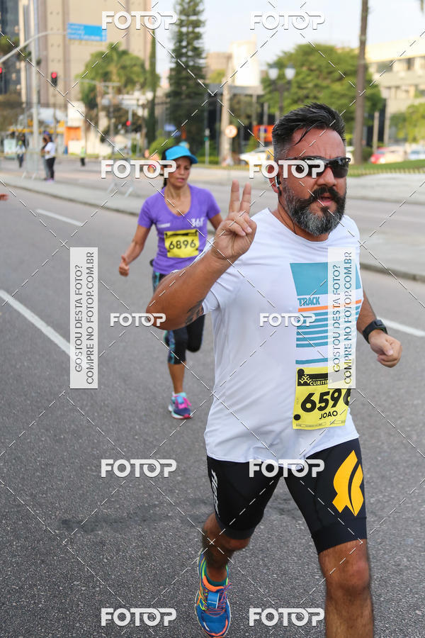 Buy your photos of the eventMeia Maratona Internacional de Curitiba 2018 on Fotop