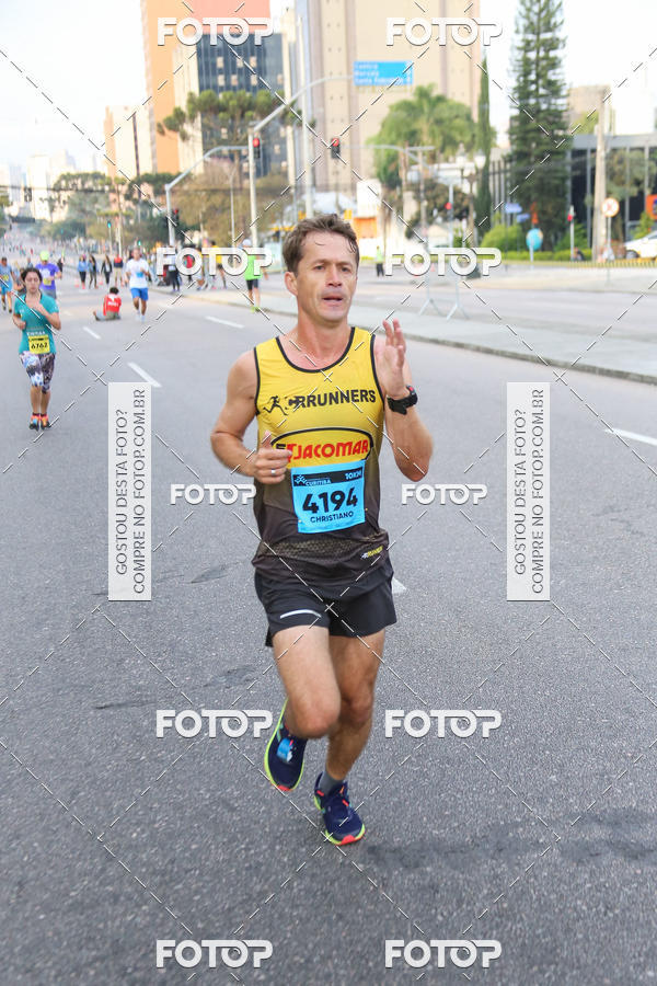 Buy your photos of the eventMeia Maratona Internacional de Curitiba 2018 on Fotop