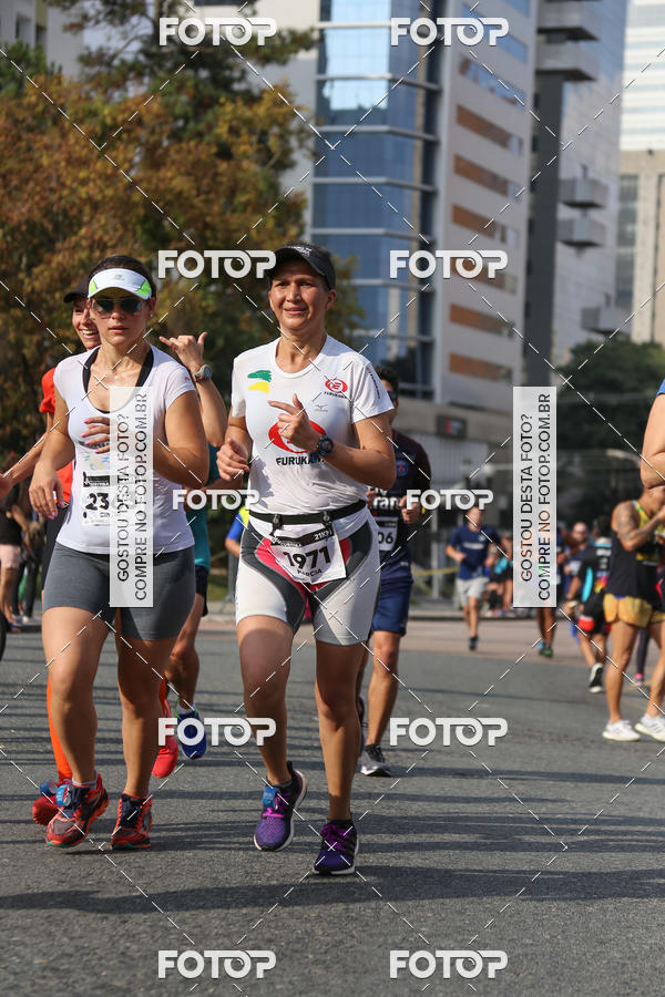 Buy your photos of the eventMeia Maratona Internacional de Curitiba 2018 on Fotop