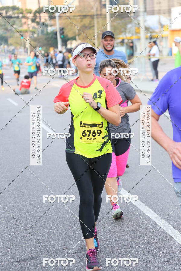 Buy your photos of the eventMeia Maratona Internacional de Curitiba 2018 on Fotop