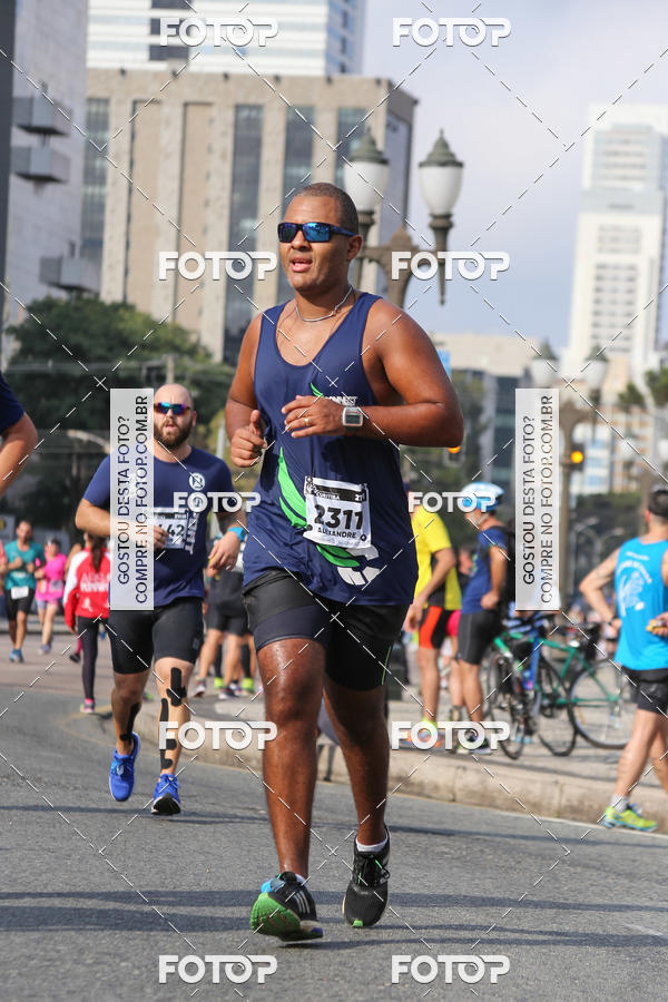 Buy your photos of the eventMeia Maratona Internacional de Curitiba 2018 on Fotop