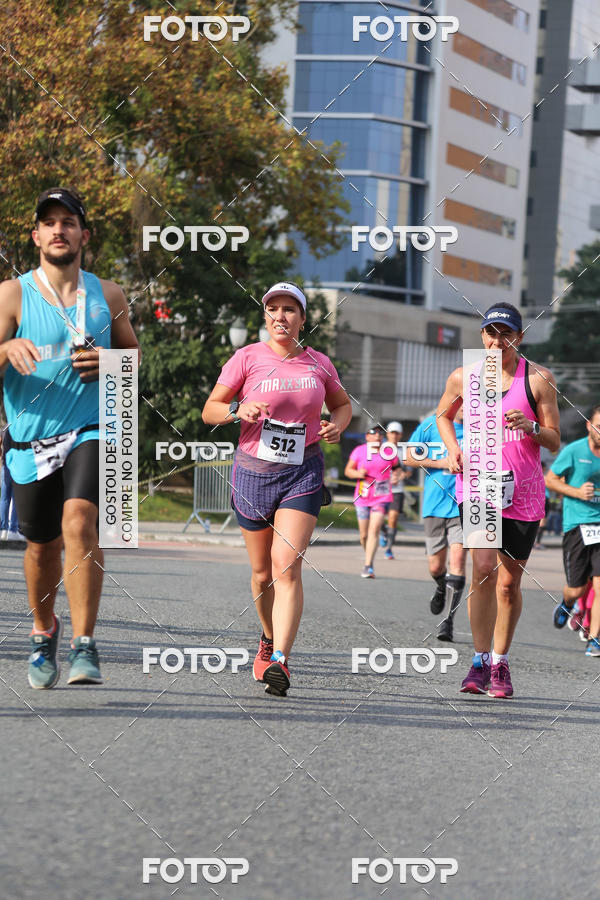 Buy your photos of the eventMeia Maratona Internacional de Curitiba 2018 on Fotop