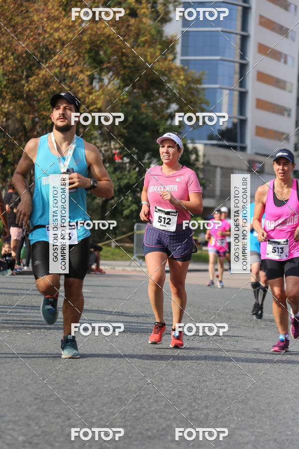 Buy your photos of the eventMeia Maratona Internacional de Curitiba 2018 on Fotop