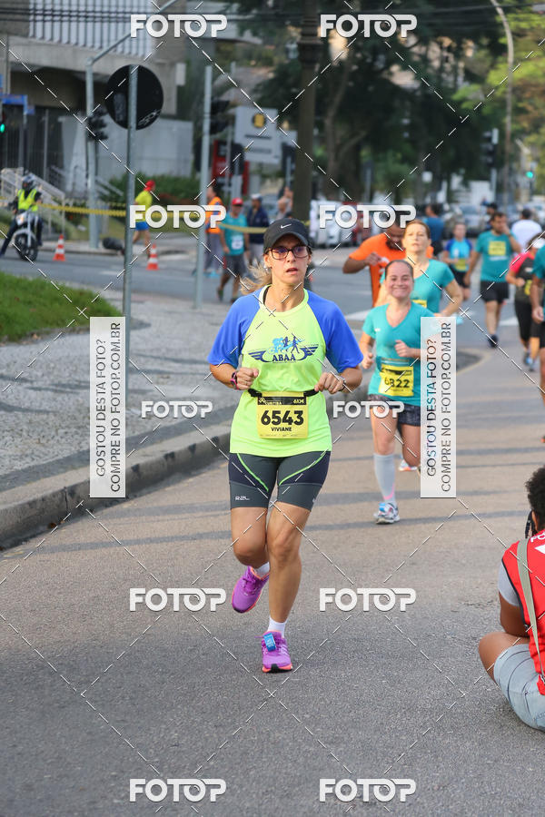 Buy your photos of the eventMeia Maratona Internacional de Curitiba 2018 on Fotop