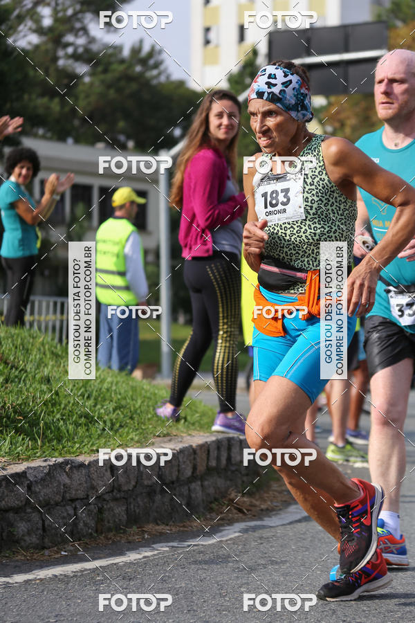 Buy your photos of the eventMeia Maratona Internacional de Curitiba 2018 on Fotop