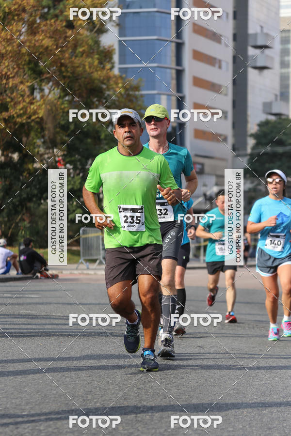 Buy your photos of the eventMeia Maratona Internacional de Curitiba 2018 on Fotop