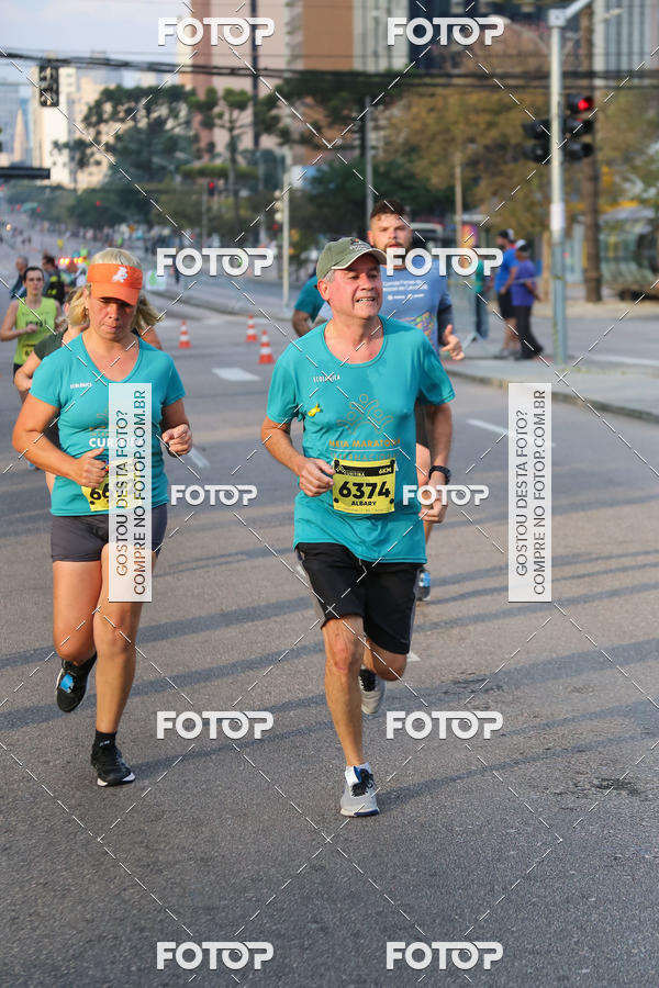 Buy your photos of the eventMeia Maratona Internacional de Curitiba 2018 on Fotop