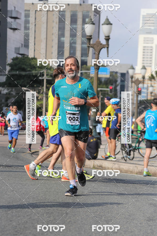 Buy your photos of the eventMeia Maratona Internacional de Curitiba 2018 on Fotop