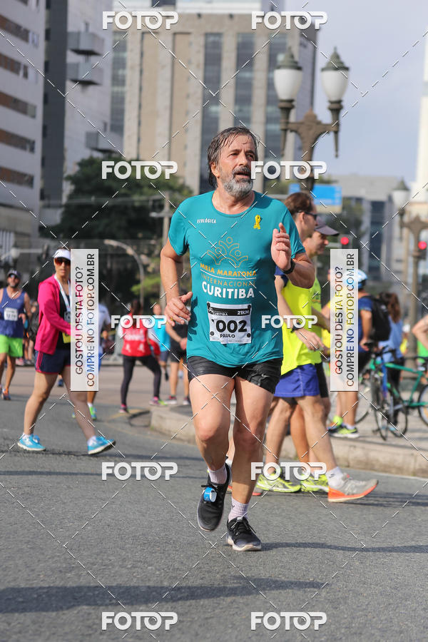 Buy your photos of the eventMeia Maratona Internacional de Curitiba 2018 on Fotop