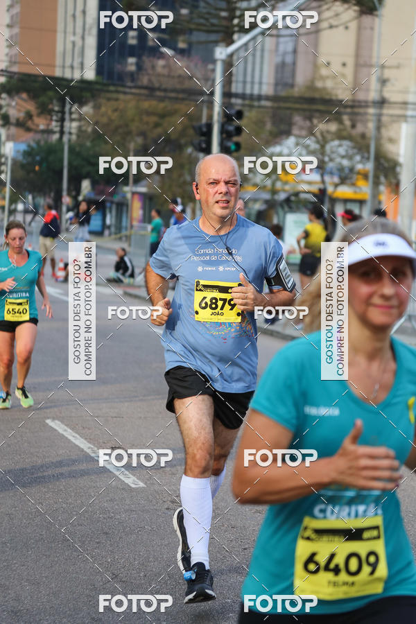 Buy your photos of the eventMeia Maratona Internacional de Curitiba 2018 on Fotop
