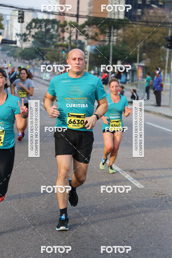 Buy your photos of the eventMeia Maratona Internacional de Curitiba 2018 on Fotop