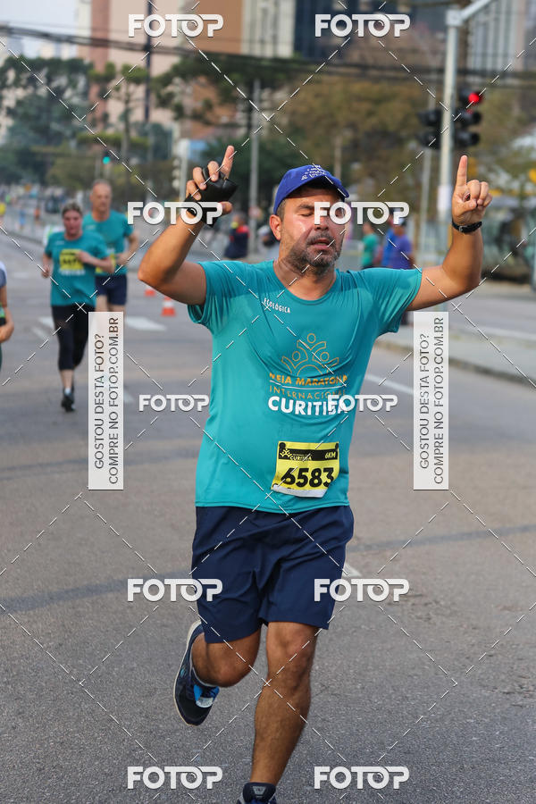 Buy your photos of the eventMeia Maratona Internacional de Curitiba 2018 on Fotop