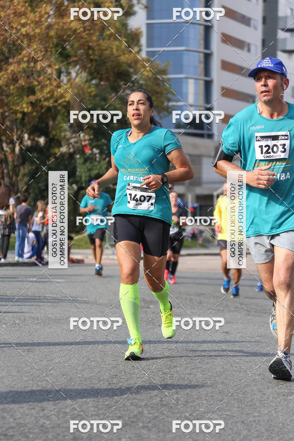 Buy your photos of the eventMeia Maratona Internacional de Curitiba 2018 on Fotop