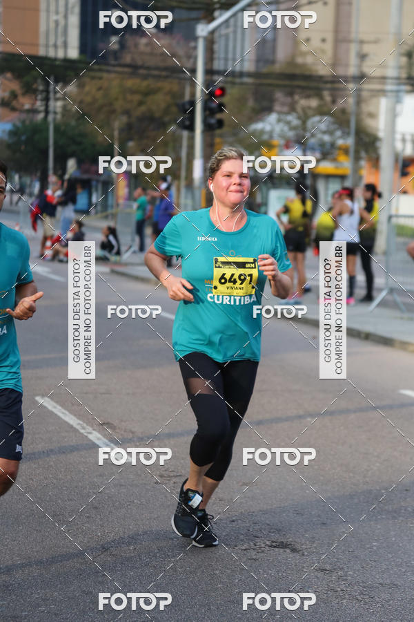Buy your photos of the eventMeia Maratona Internacional de Curitiba 2018 on Fotop