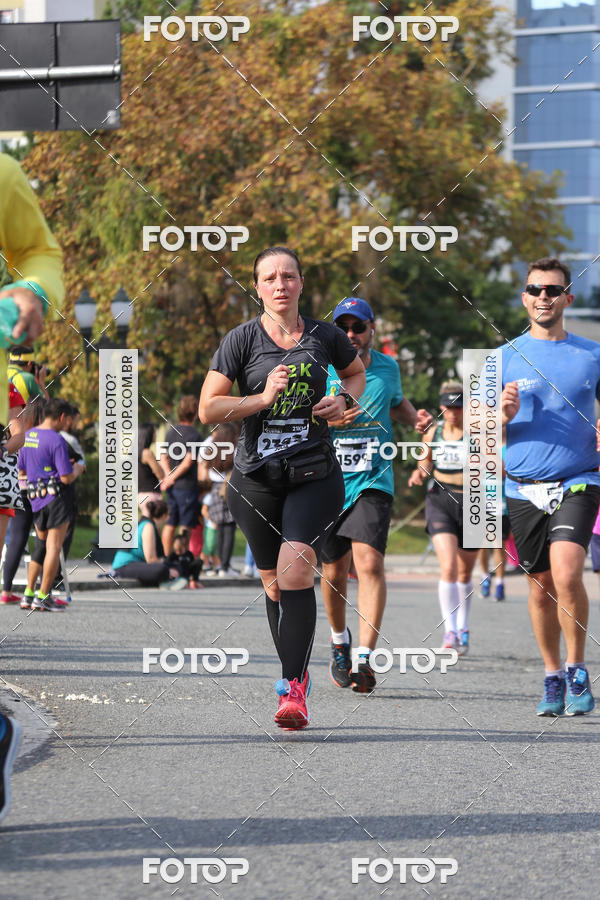 Buy your photos of the eventMeia Maratona Internacional de Curitiba 2018 on Fotop
