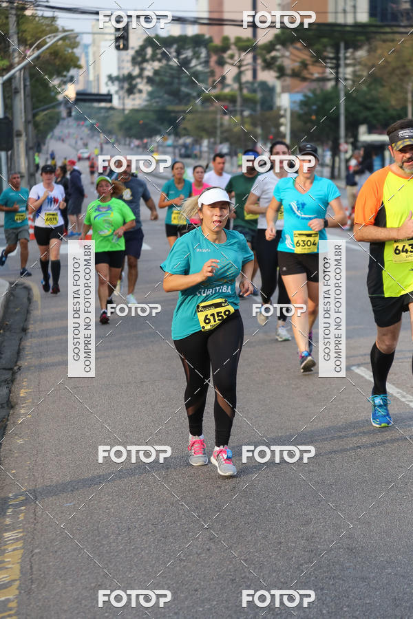 Buy your photos of the eventMeia Maratona Internacional de Curitiba 2018 on Fotop