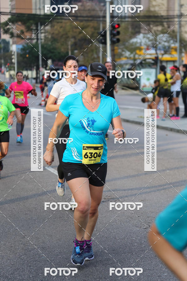 Buy your photos of the eventMeia Maratona Internacional de Curitiba 2018 on Fotop
