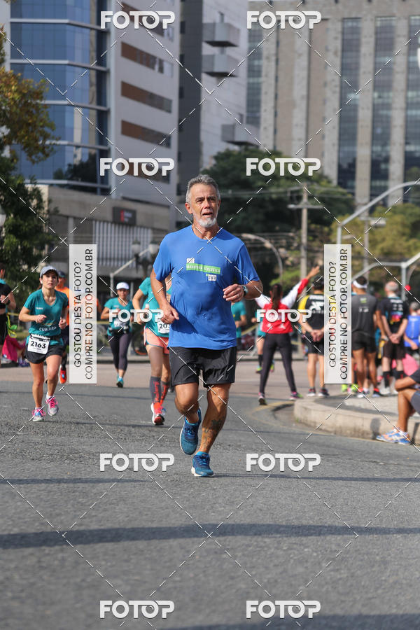 Buy your photos of the eventMeia Maratona Internacional de Curitiba 2018 on Fotop