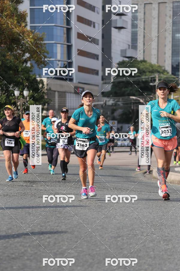 Buy your photos of the eventMeia Maratona Internacional de Curitiba 2018 on Fotop
