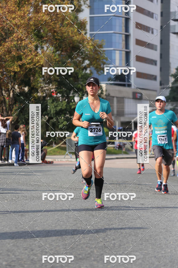 Buy your photos of the eventMeia Maratona Internacional de Curitiba 2018 on Fotop
