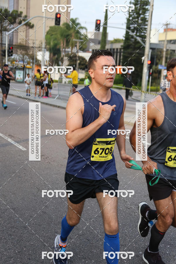 Buy your photos of the eventMeia Maratona Internacional de Curitiba 2018 on Fotop