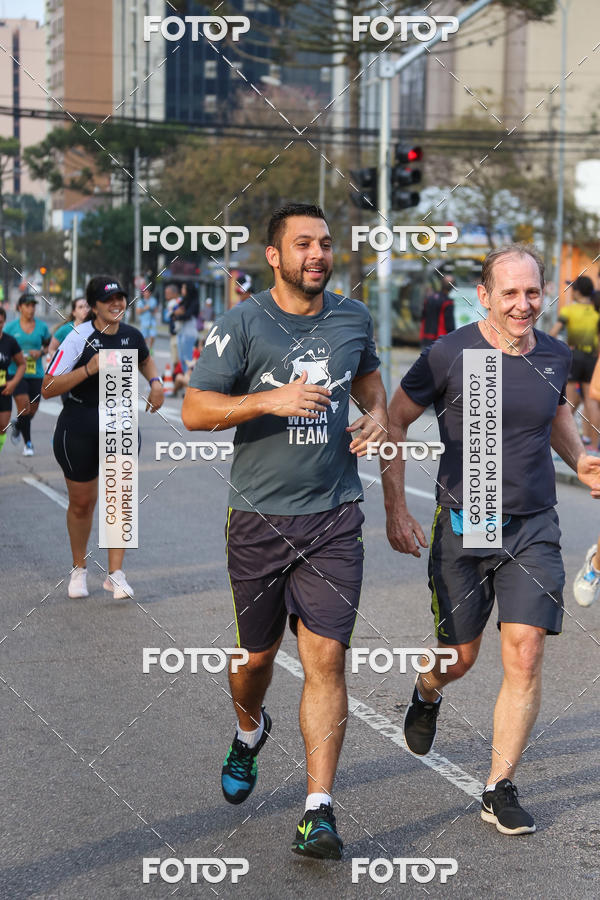 Buy your photos of the eventMeia Maratona Internacional de Curitiba 2018 on Fotop