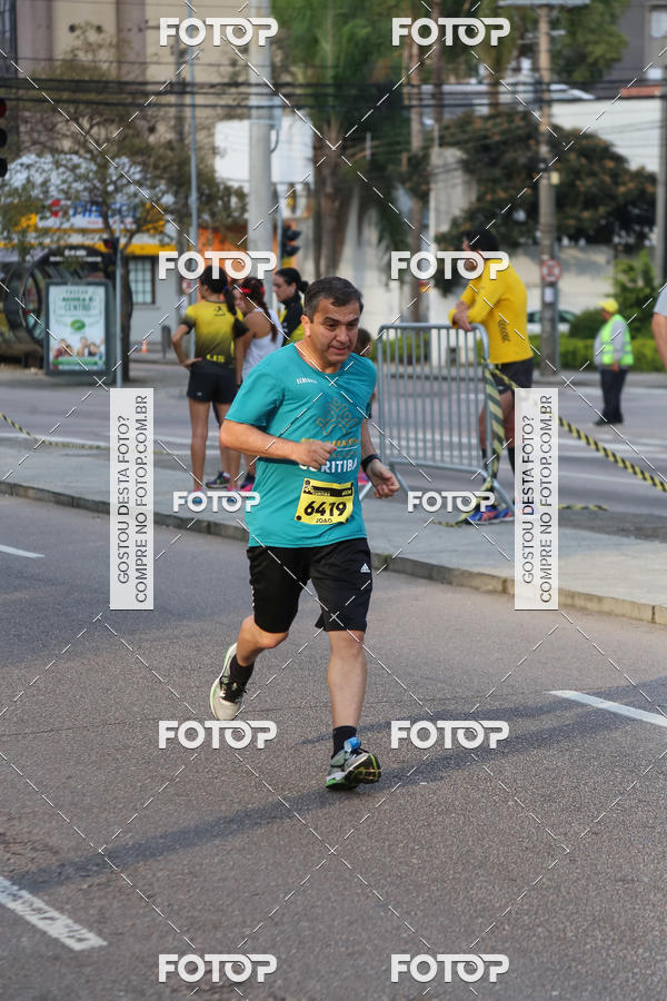 Buy your photos of the eventMeia Maratona Internacional de Curitiba 2018 on Fotop