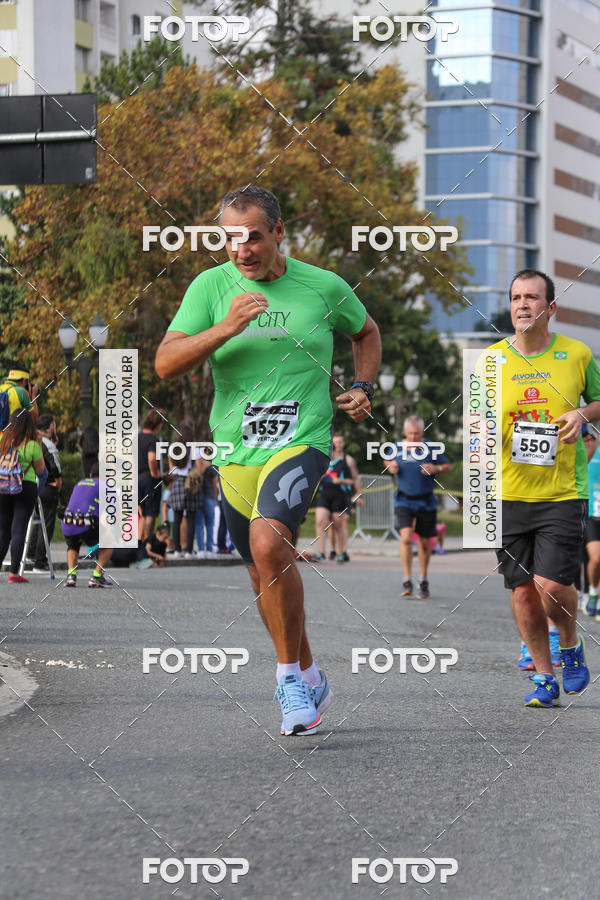 Buy your photos of the eventMeia Maratona Internacional de Curitiba 2018 on Fotop