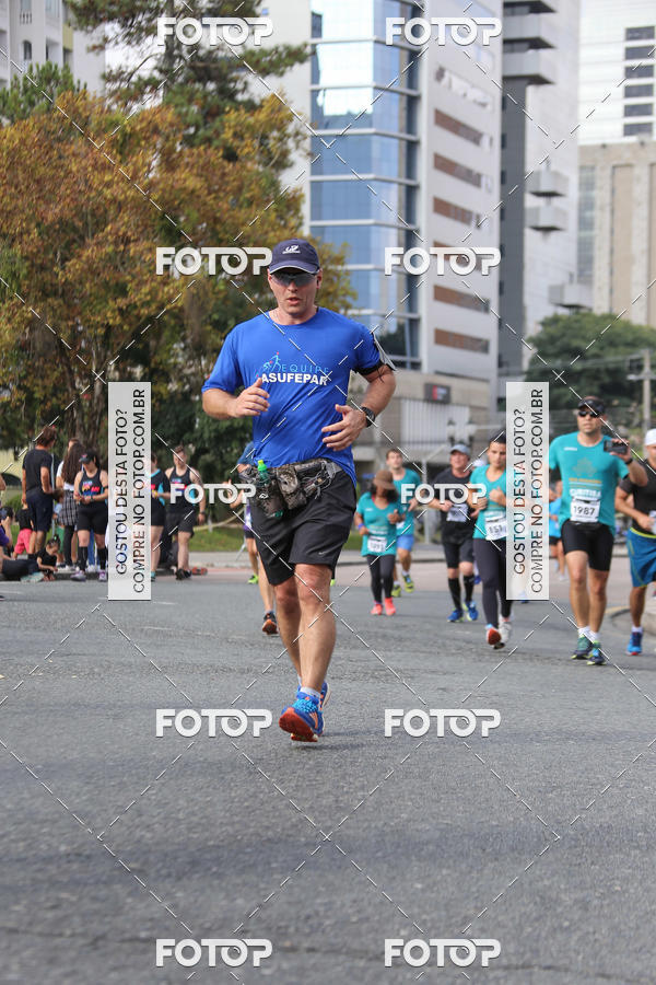 Buy your photos of the eventMeia Maratona Internacional de Curitiba 2018 on Fotop